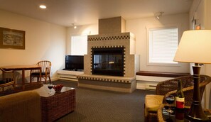 Suite, 1 Bedroom, Ground Floor (No View) | Living area | 32-inch flat-screen TV with cable channels, TV, DVD player