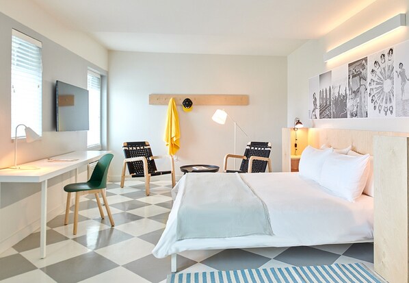 Premium bedding, down comforters, pillowtop beds, in-room safe