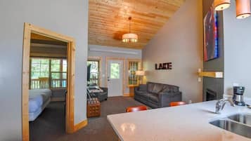 Cabin, 1 Bedroom, Lake View | Living area | Flat-screen TV, fireplace