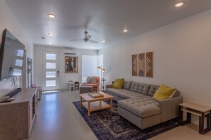 Family Townhome, 4 Bedrooms, Poolside | Living area | Flat-screen TV
