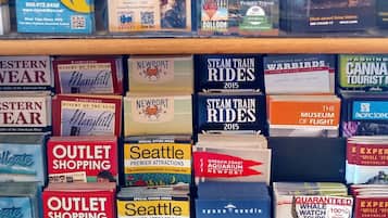 A variety of travel guides and brochures for different destinations and activities.