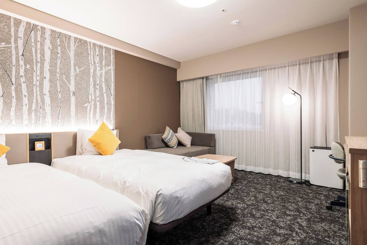 Down duvets, desk, blackout curtains, iron/ironing board (on request)