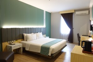 Habitación Grand (Deluxe) | Ropa de cama de alta calidad, caja fuerte, escritorio y cortinas opacas