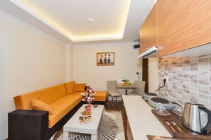 Apartment, Eckzimmer | Hochwertige Bettwaren, Minibar, Zimmersafe, schallisolierte Zimmer