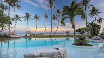 Outdoor pool, pool umbrellas, sun loungers