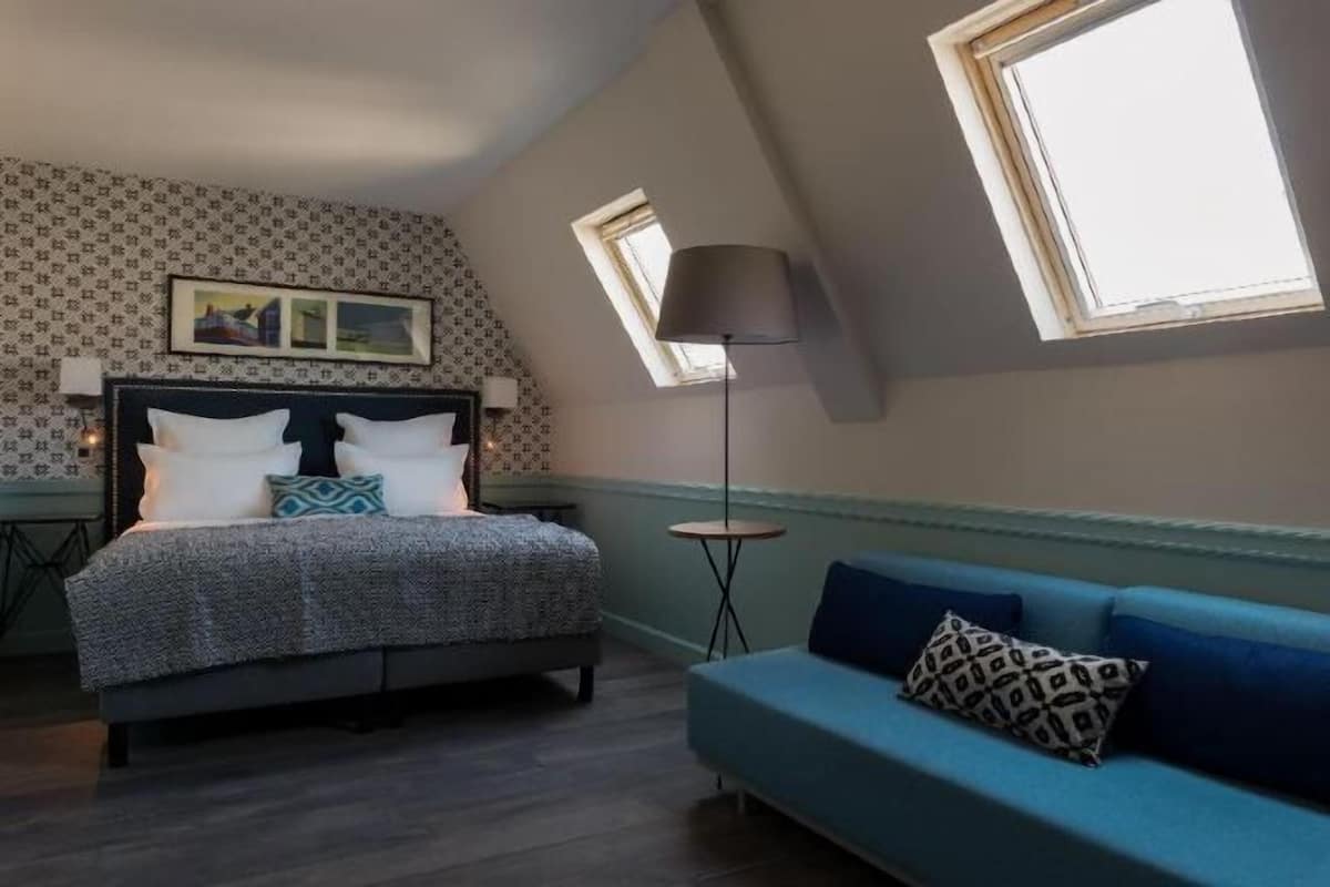 Literie de qualité supérieure, coffres-forts dans les chambres, bureau