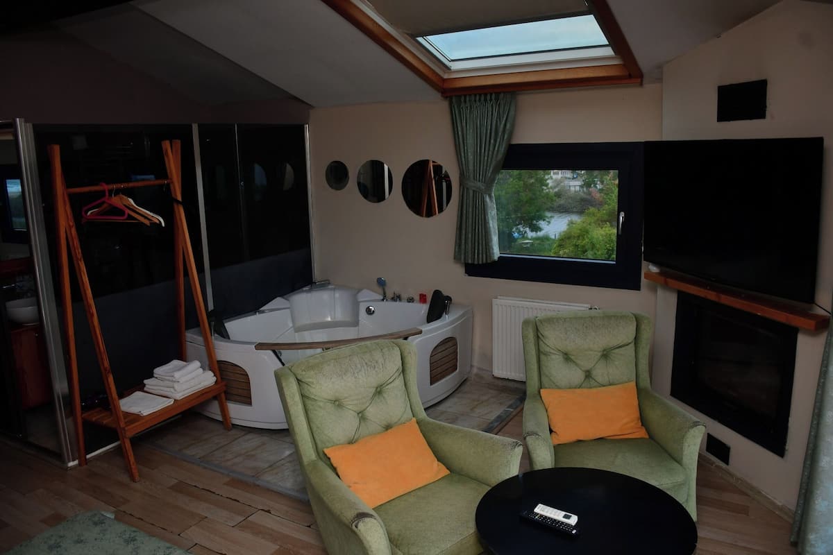 Luxury Room, Fireplace, Sea View | Minibar, in-room safe, laptop workspace, soundproofing