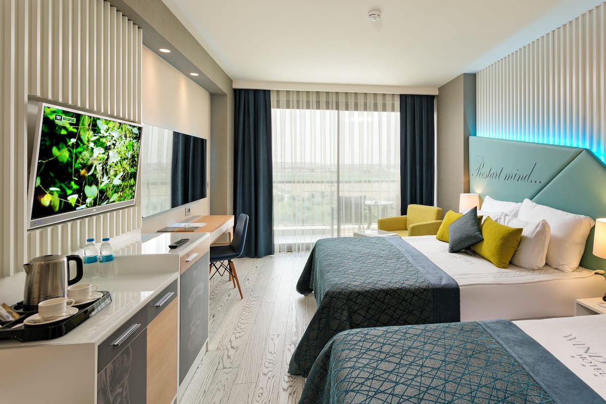 Deluxe Standard Room | Living area | LED TV