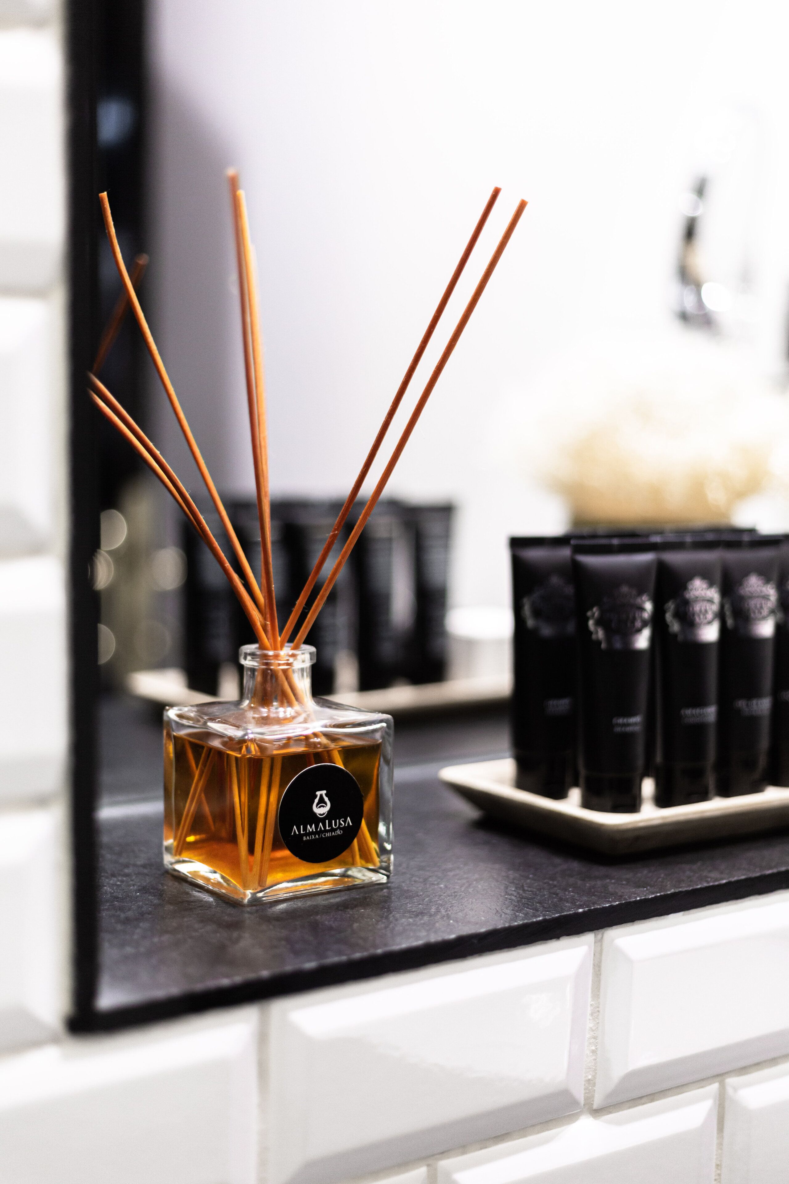 deluxe suite (square view) | bathroom | shower, designer toiletries, hair dryer, slippers