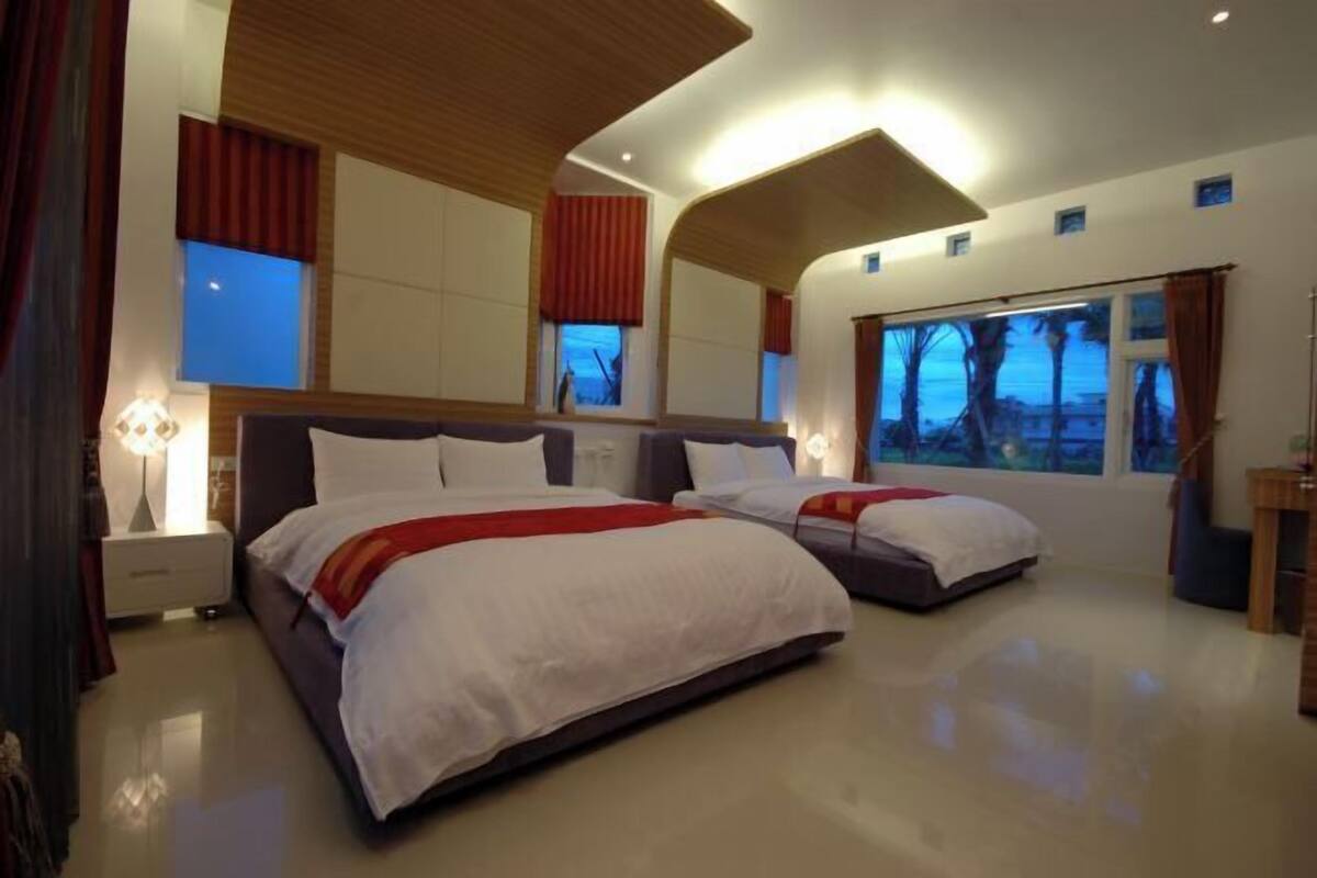 Premium bedding, down comforters, blackout drapes, soundproofing