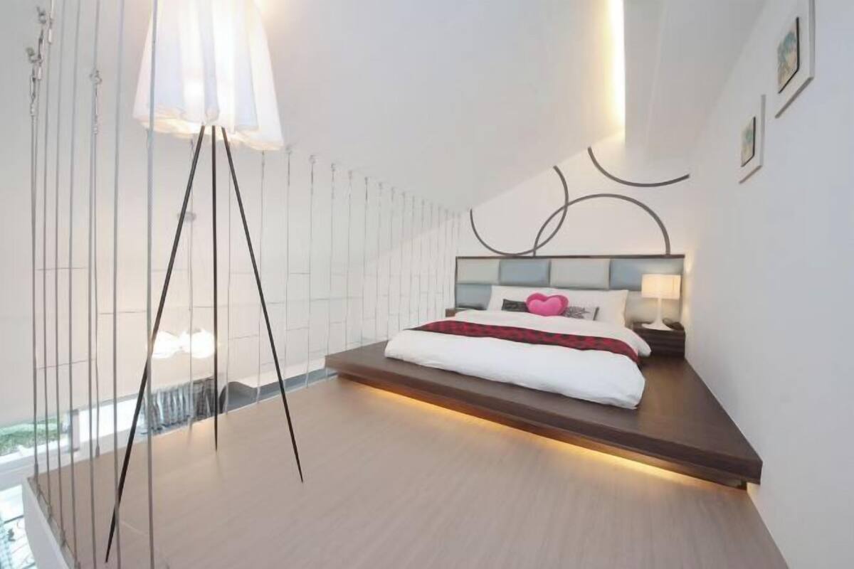 Premium bedding, down comforters, blackout drapes, soundproofing