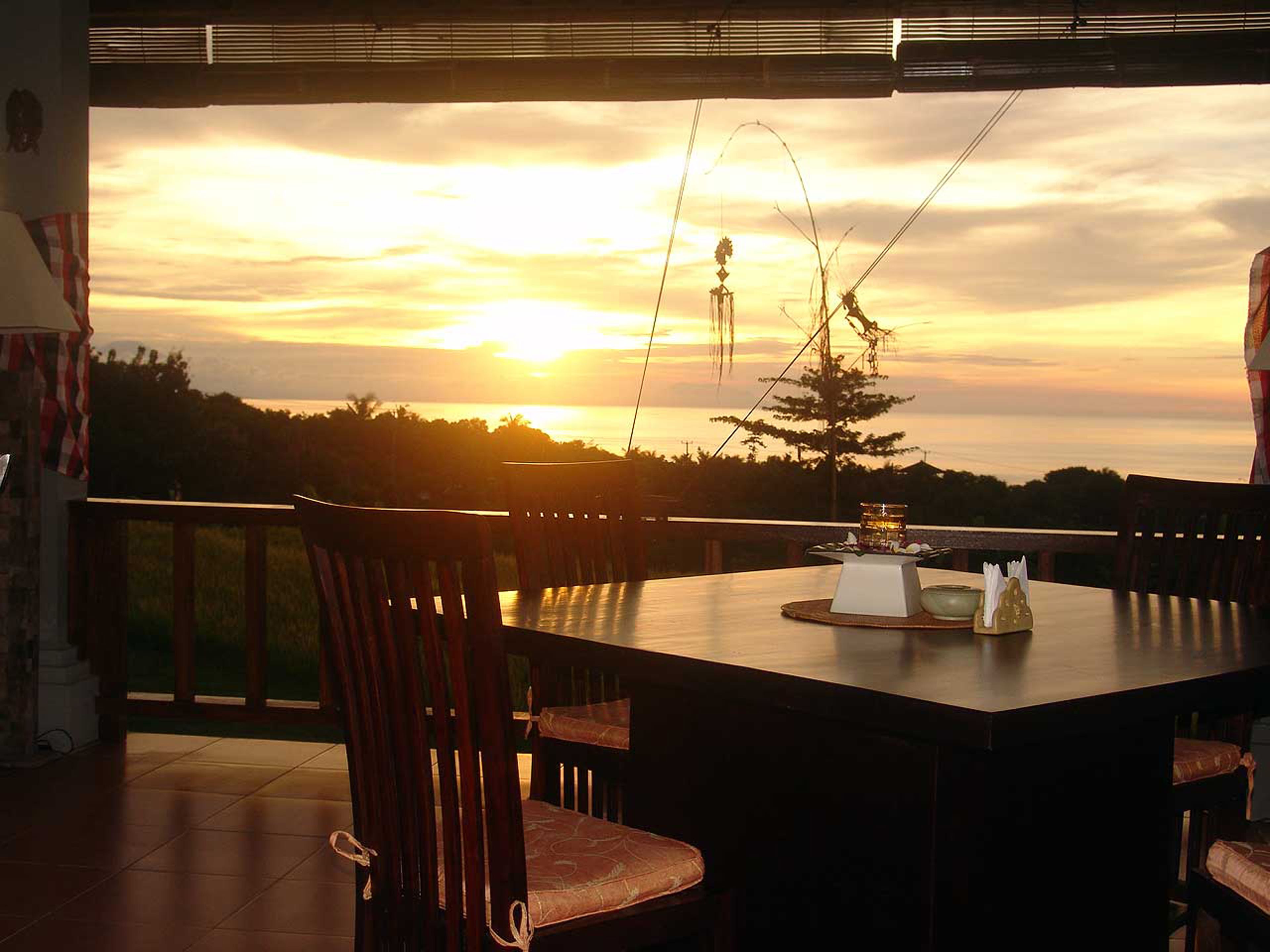 Breakfast, lunch, dinner served; Indonesian cuisine, pool views 