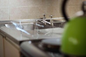 Combinació de dutxa i banyera i tovalloles 