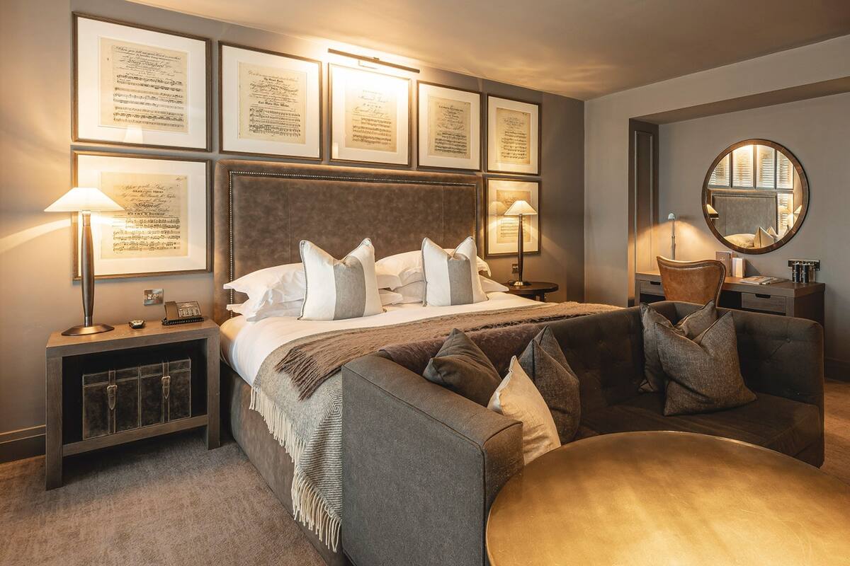signature suite | premium bedding, in-room safe, desk, iron/ironing board