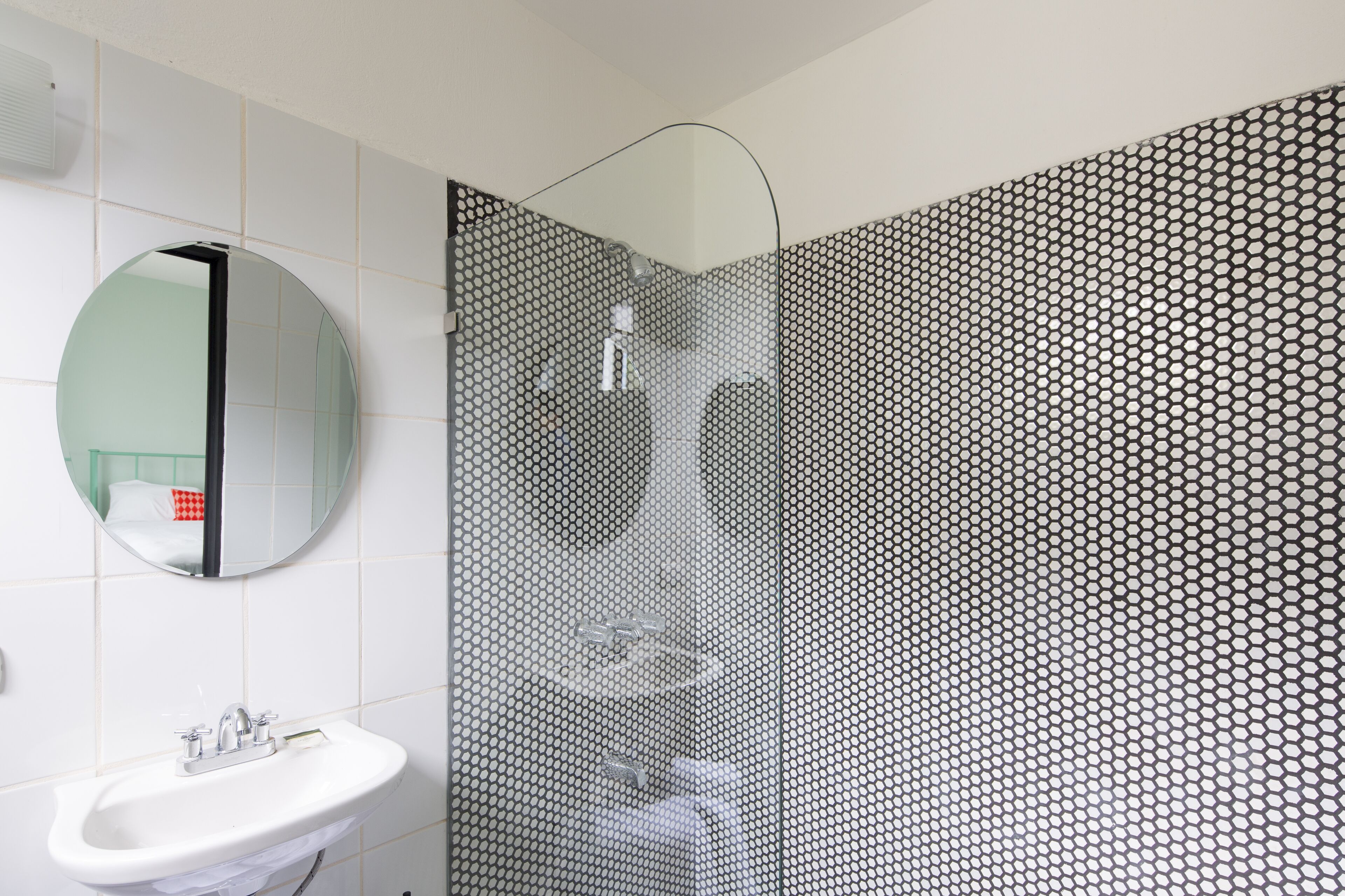 deluxe room, 2 queen beds | bathroom | shower, free toiletries, towels