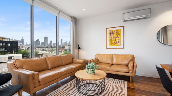 Two Bedroom Deluxe Apartment City View | Living area