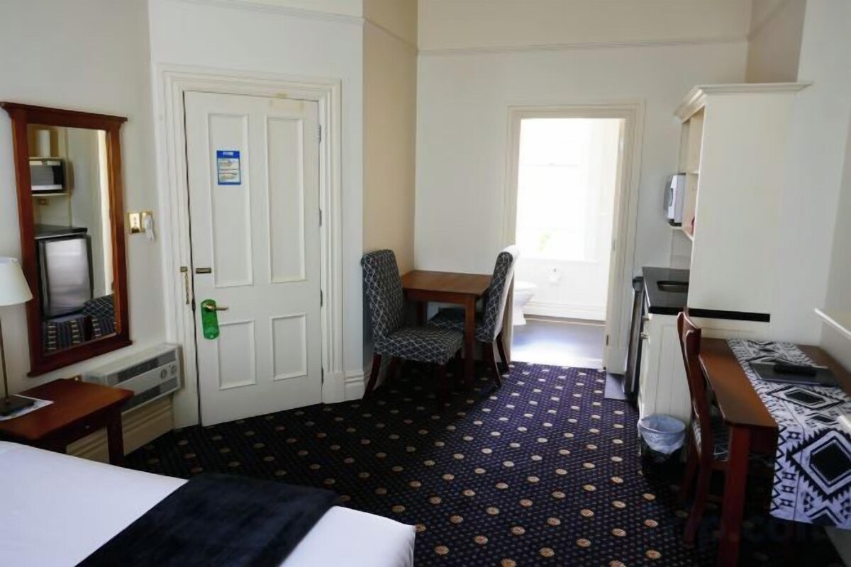 Down comforters, laptop workspace, blackout drapes, soundproofing