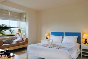 Luxe beddengoed, een minibar, een kluis op de kamer, een bureau