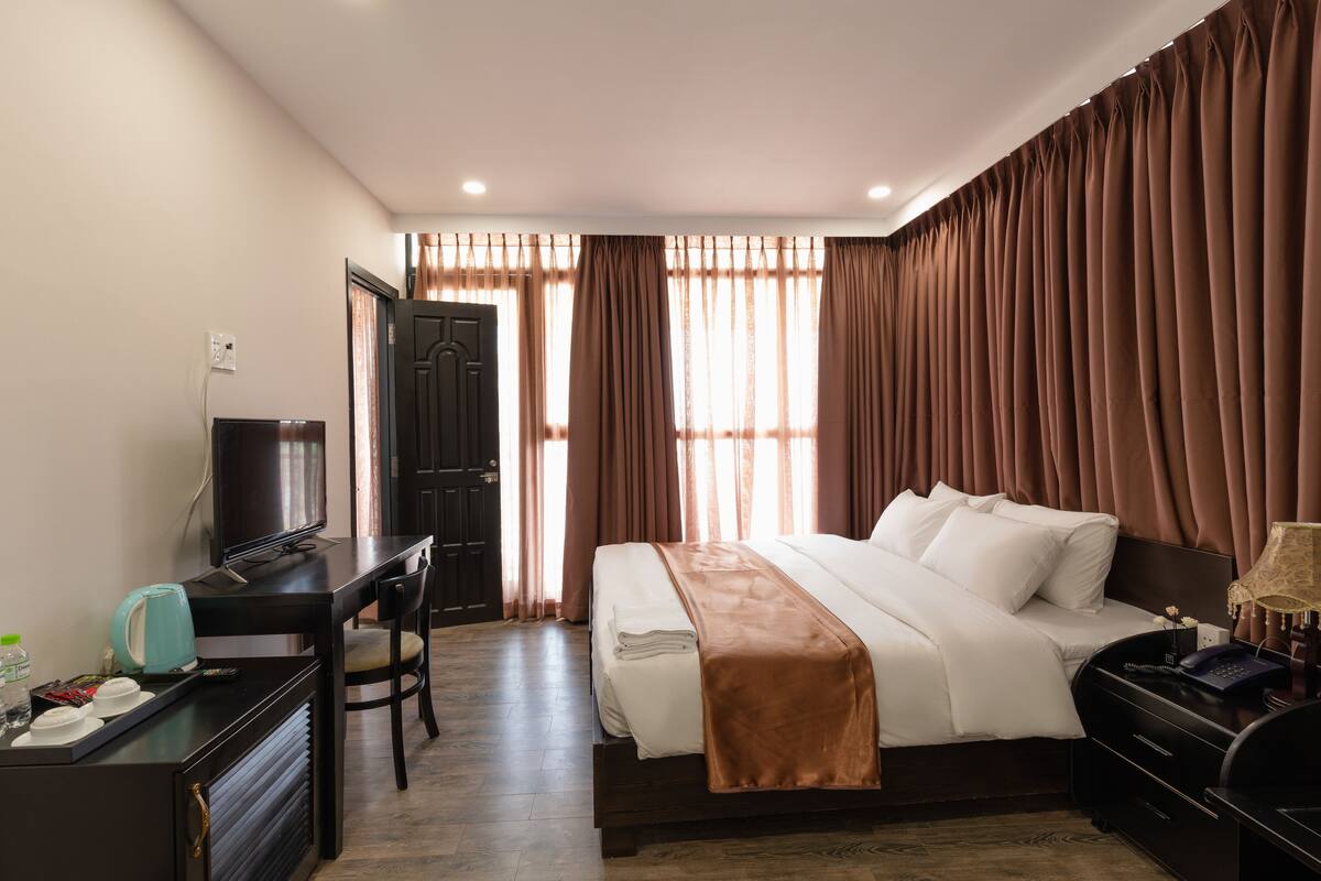 Phòng Suite phong cách lãng mạn | Minibar, két bảo mật tại phòng, bàn, phòng cách âm 