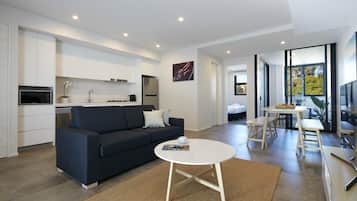 One Bedroom Apartment | Living area | Flat-screen TV
