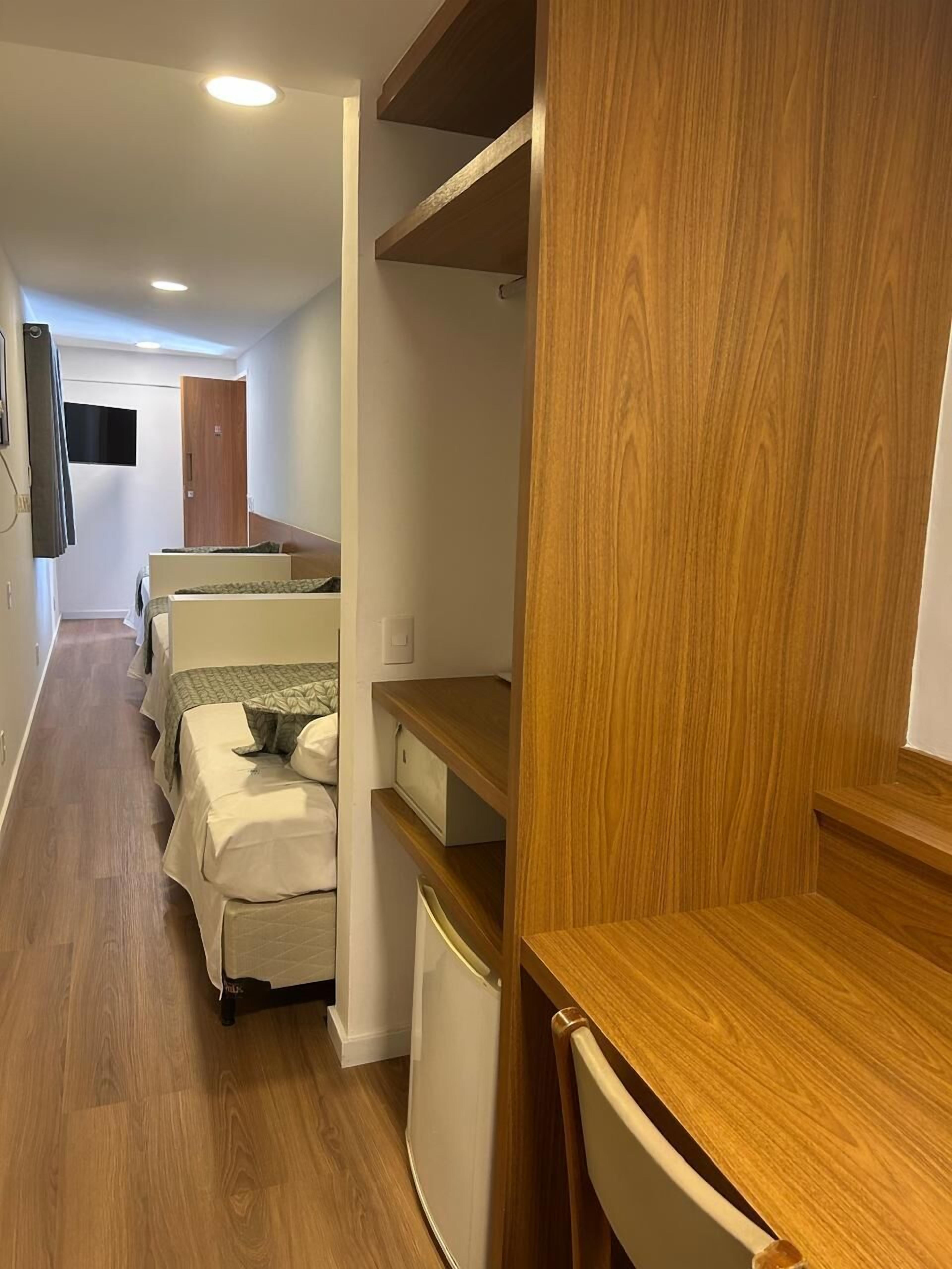 Economy Triple Room | Minibar, in-room safe, free WiFi, bed sheets