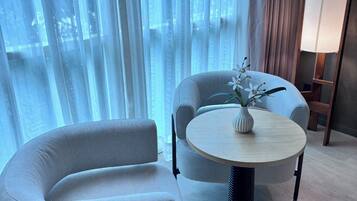 Hypo-allergenic bedding, free minibar items, in-room safe