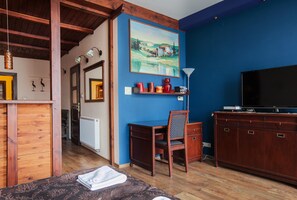 Apartment, 1 Bedroom | Living area | Flat-screen TV - EchoDom 5 Apartments Florianska (Kraków)