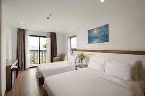 Executive Triple Room, Balcony, Mountain View | Minibar, in-room safe, desk, laptop workspace - The Sol Hotel (Nha Trang)