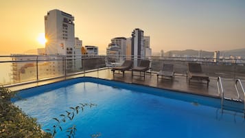 Outdoor pool, a rooftop pool, open 6:00 AM to 10:00 PM, sun loungers