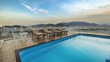 Outdoor pool, a rooftop pool, open 6:00 AM to 10:00 PM, sun loungers