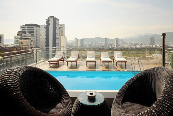 Outdoor pool, a rooftop pool, open 6:00 AM to 10:00 PM, sun loungers - The Sol Hotel (Nha Trang)