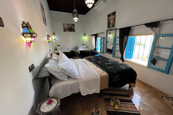 Classic Quadruple Room, 1 Bedroom, Private Bathroom, Mountain View | Egyptian cotton sheets, desk, laptop workspace, blackout drapes