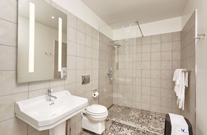 Shower, free toiletries, hair dryer, bathrobes