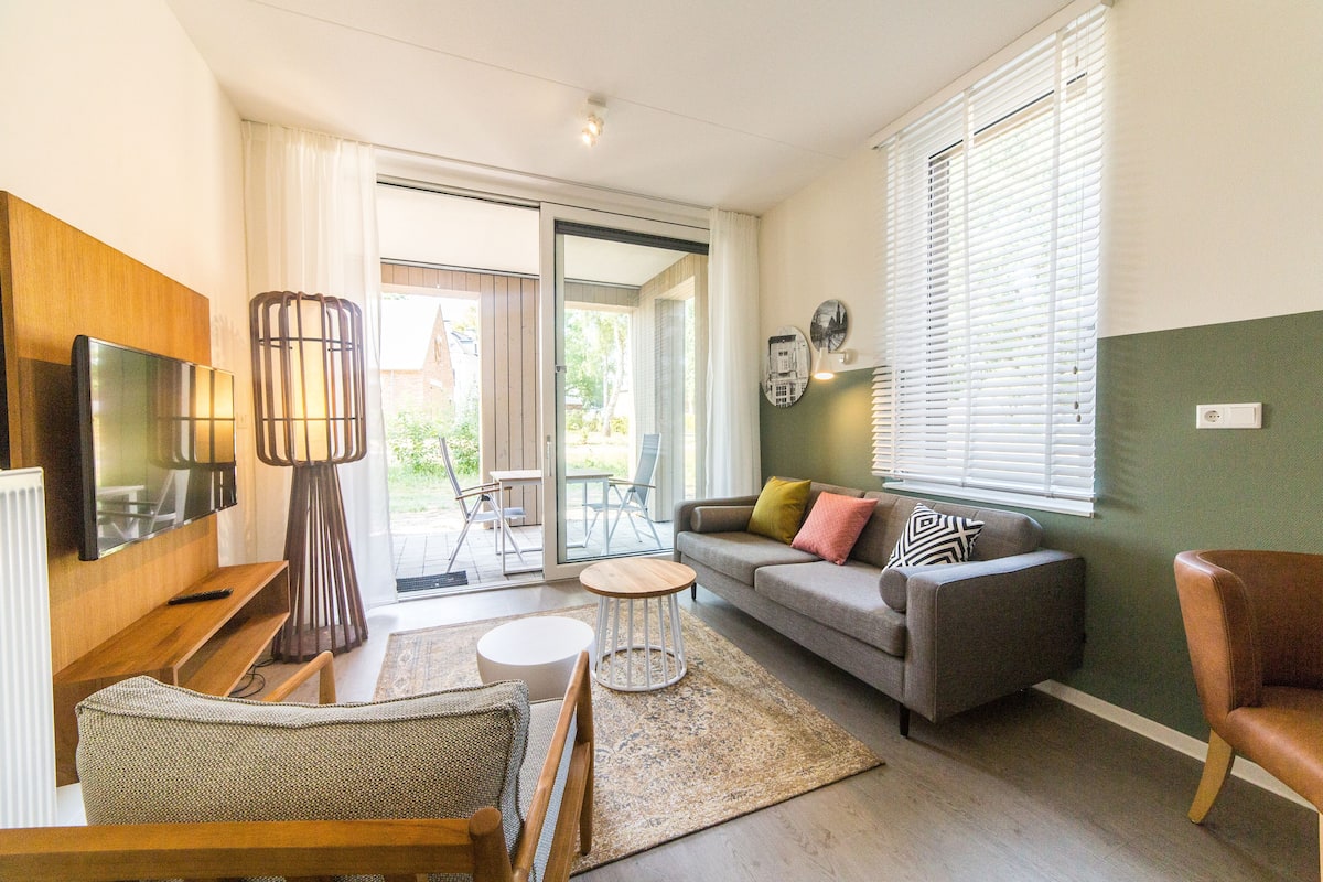 Appartamento Comfort, 1 camera da letto | Area soggiorno | TV a schermo piatto 32 pollici con canali via cavo, TV