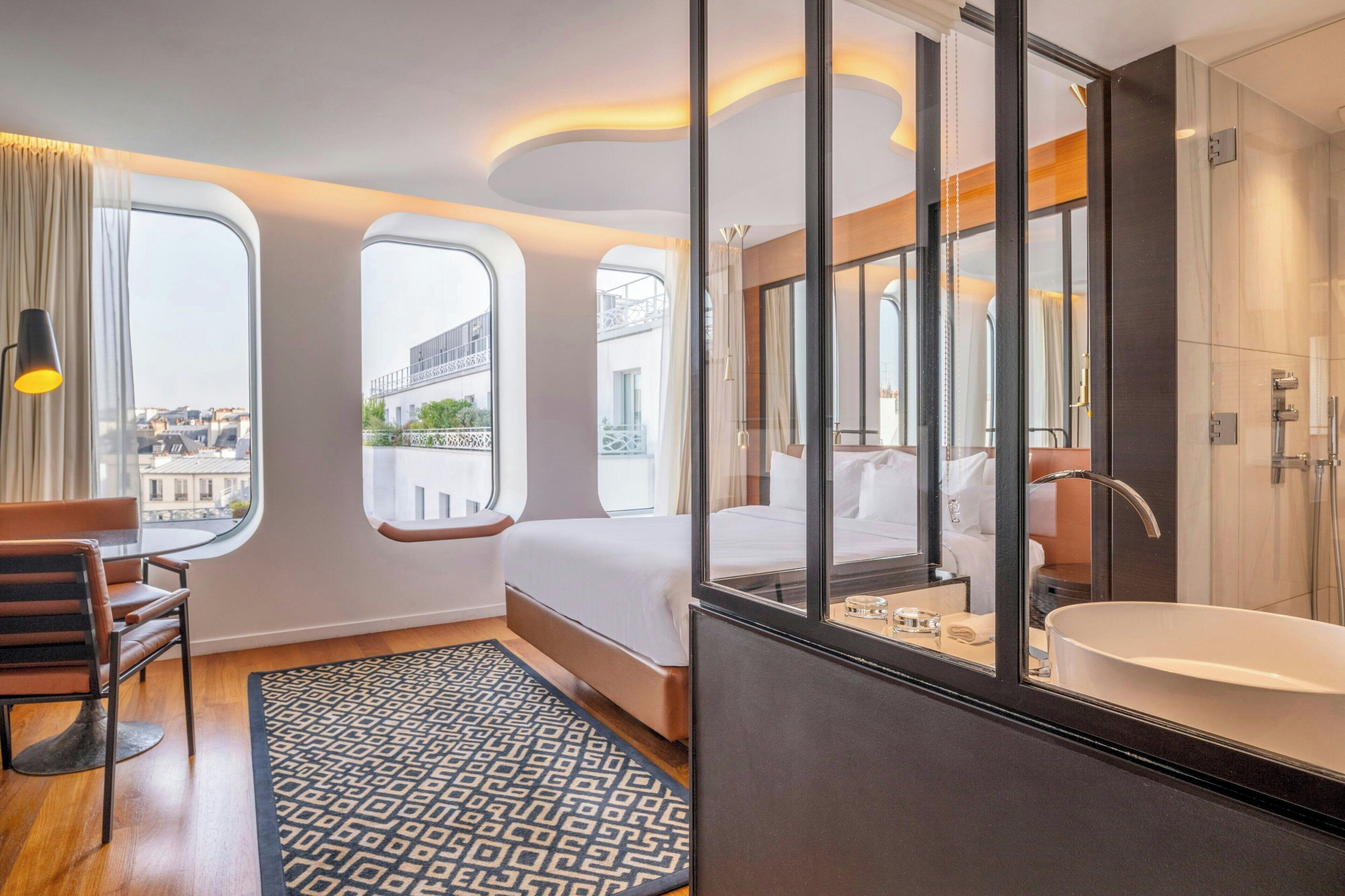 designer toiletries, hair dryer, bathrobes, towels