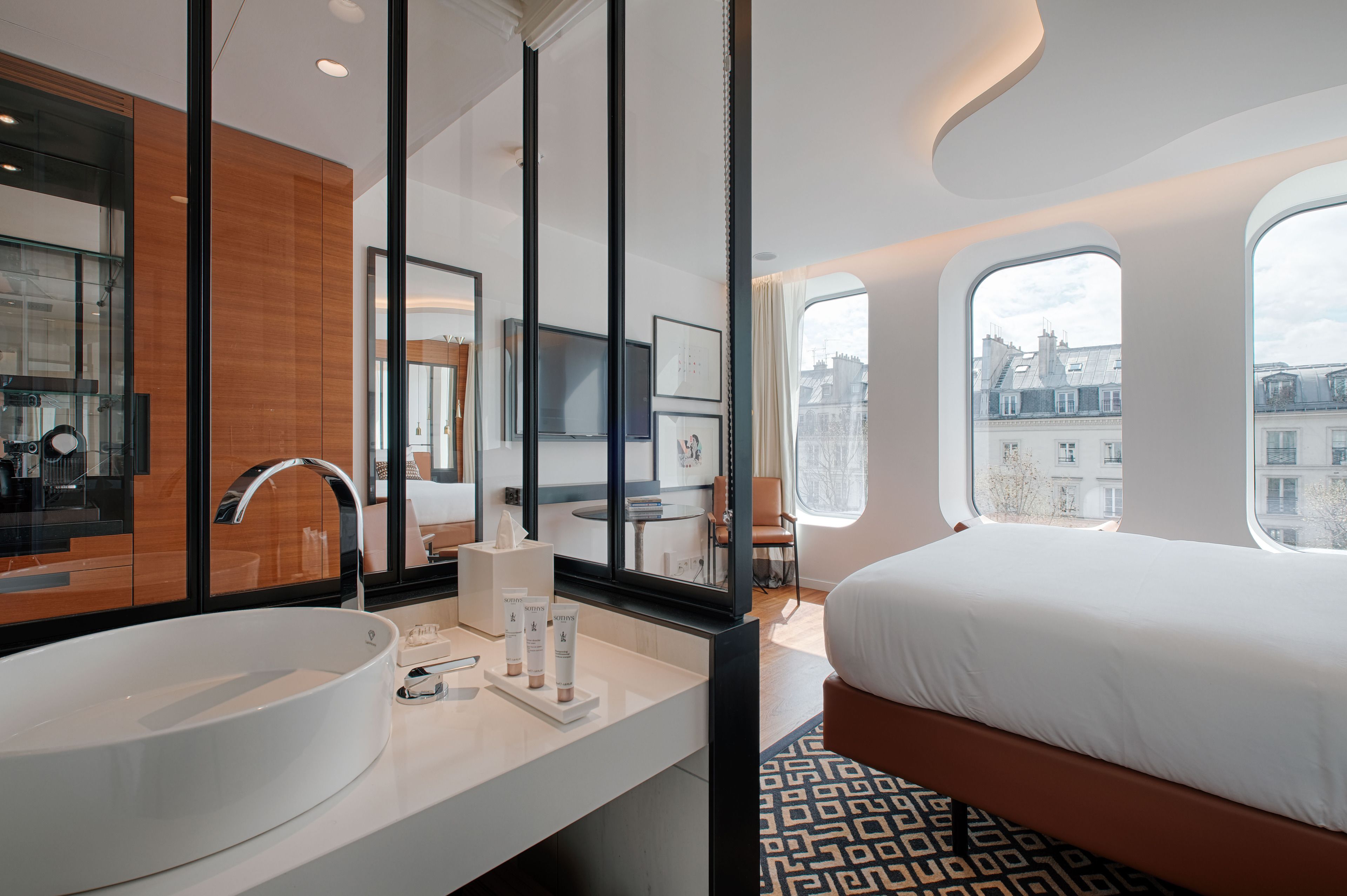 designer toiletries, hair dryer, bathrobes, towels