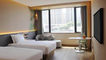Superior Twin Room | Minibar, in-room safe, desk, laptop workspace
