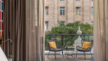 Standard Room, 1 King Bed, Balcony | In-room safe, desk, soundproofing, iron/ironing board