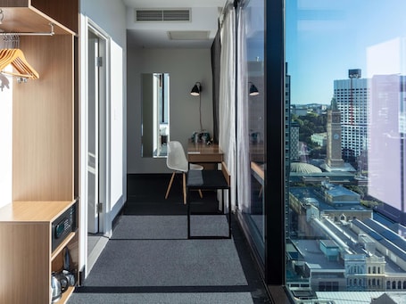 Deluxe Room, 1 King Bed, City View, Corner | In-room safe, desk, soundproofing, iron/ironing board. Ibis Styles Brisbane Elizabeth Street