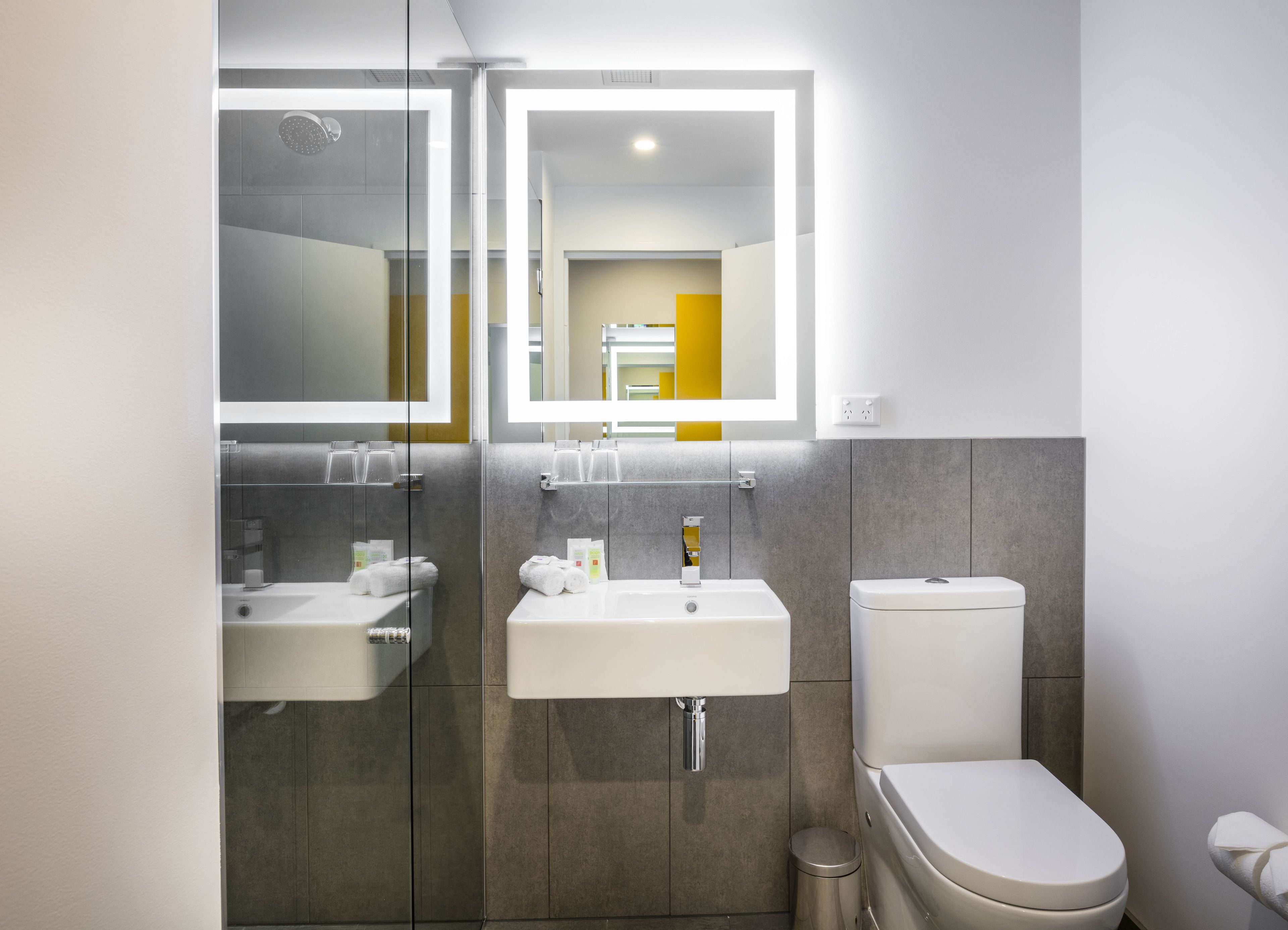 shower, eco-friendly toiletries, hair dryer, towels