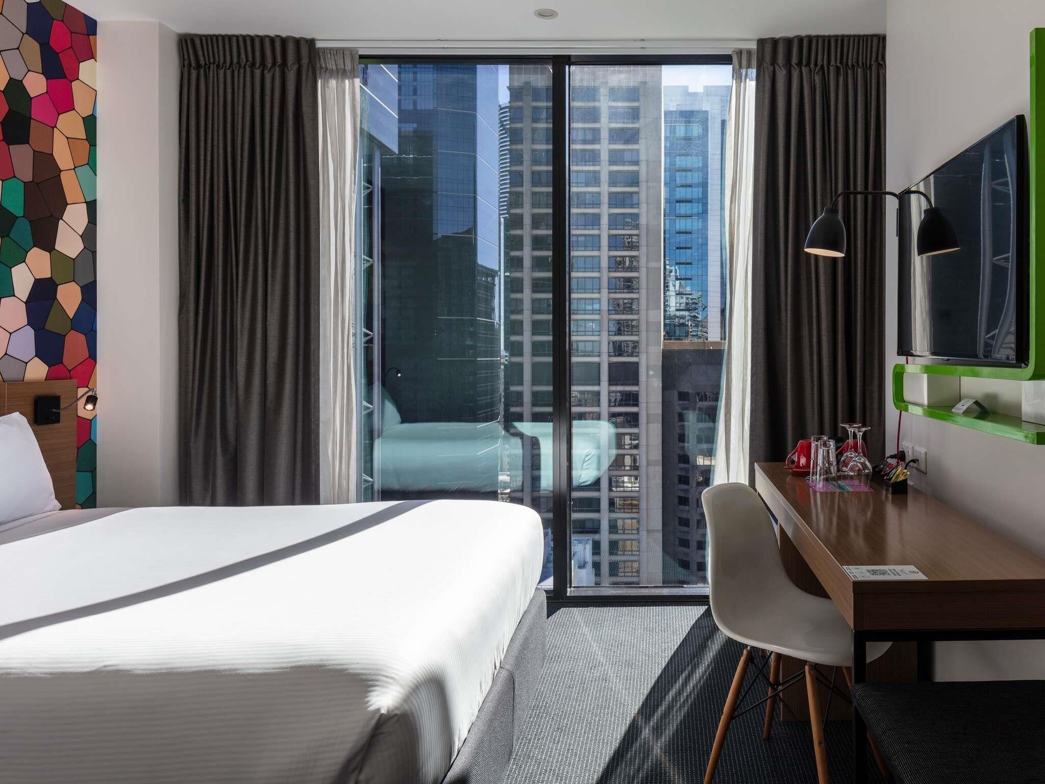 Superior Room, 1 King Bed, City View | In-room safe, desk, soundproofing, iron/ironing board