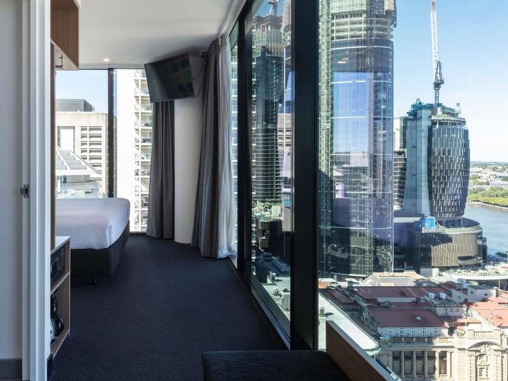 Deluxe Room, 1 King Bed, River View, Corner | In-room safe, desk, soundproofing, iron/ironing board
