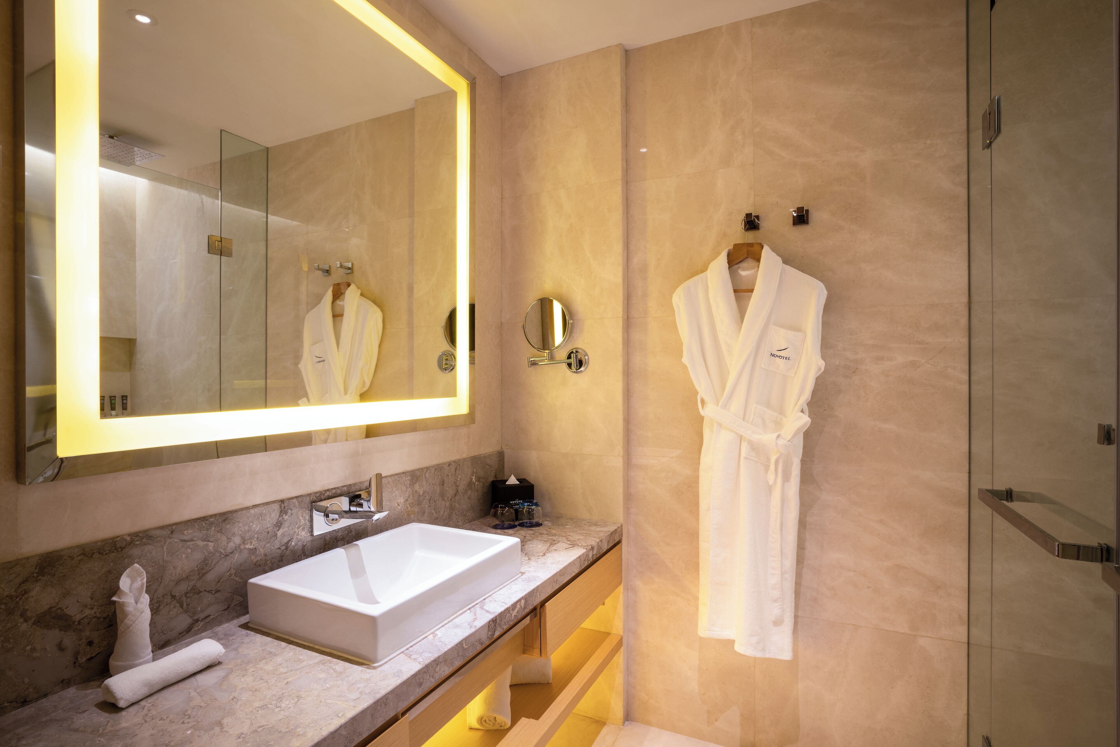 eco-friendly toiletries, hair dryer, bathrobes, slippers