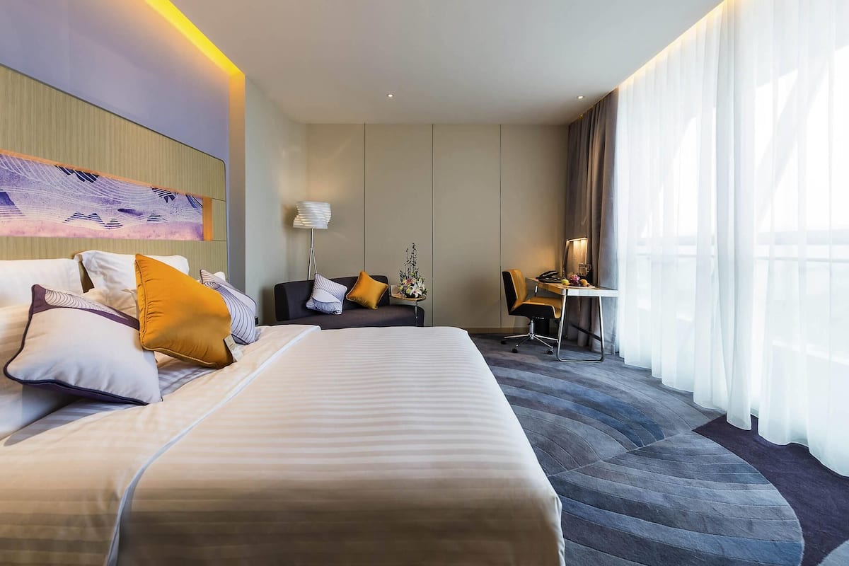 Quarto premier, 1 cama King | 1 quarto, roupas de cama premium, frigobar, cofres nos quartos