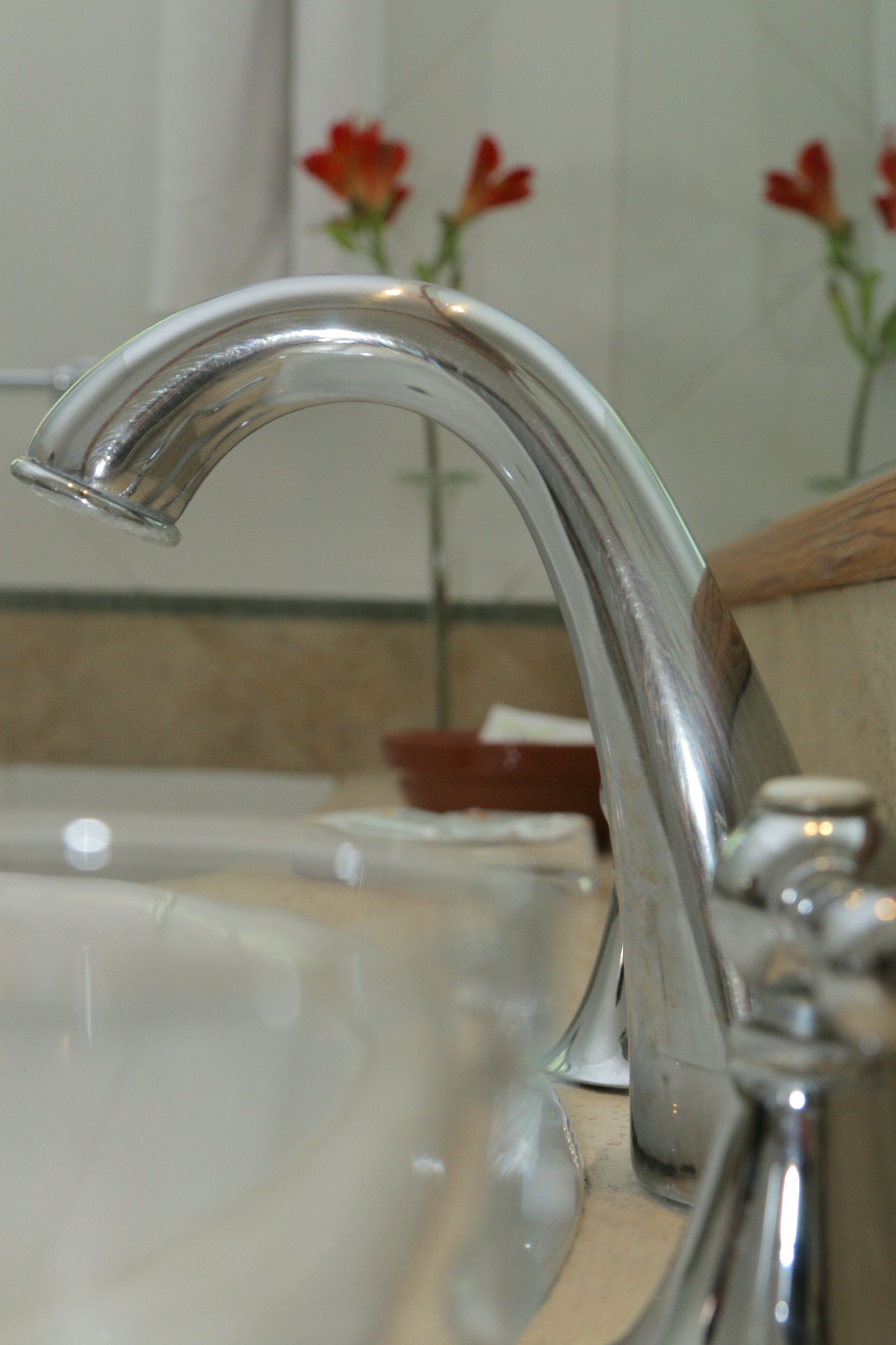 A bathroom sink with a modern faucet.