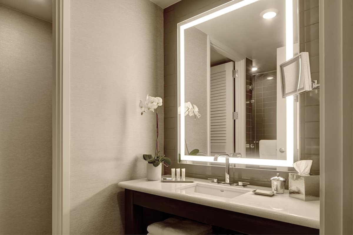 Designer toiletries, hair dryer, bathrobes, slippers