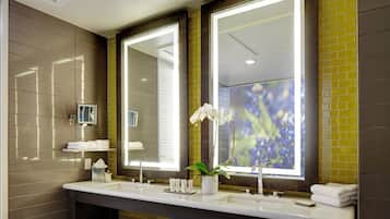 Designer toiletries, hair dryer, bathrobes, slippers