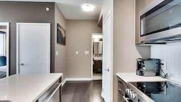 Condo, 1 Queen Bed with Sofa bed, Balcony, City View | Private kitchen | Coffee/tea maker, fridge, microwave, oven