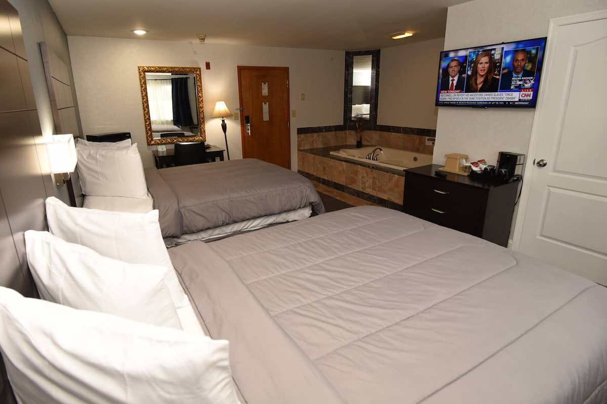 Deluxe Room, Multiple Beds, Non Smoking, Jetted Tub, 1 King and 1 Queen Bed | 1 bedroom, premium bedding, in-room safe, desk