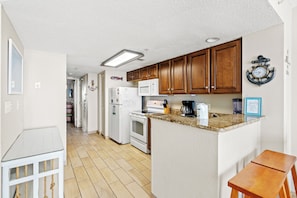 Condo, 1 Bedroom, Balcony, Oceanfront (III-PH64) | Private kitchen | Fridge, microwave, stovetop, dishwasher